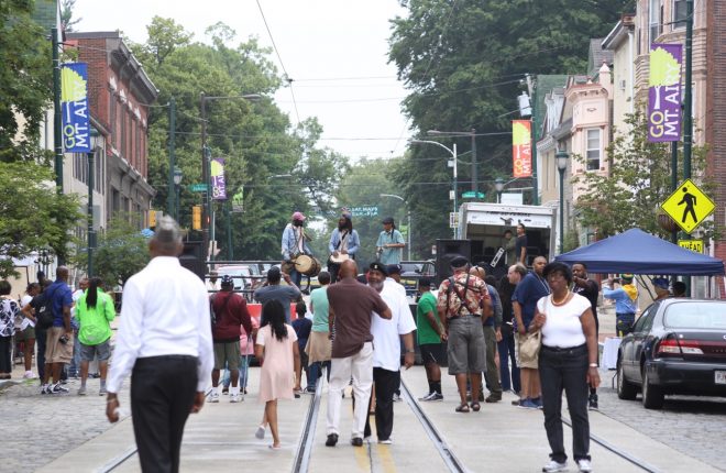 People on a street for a festival