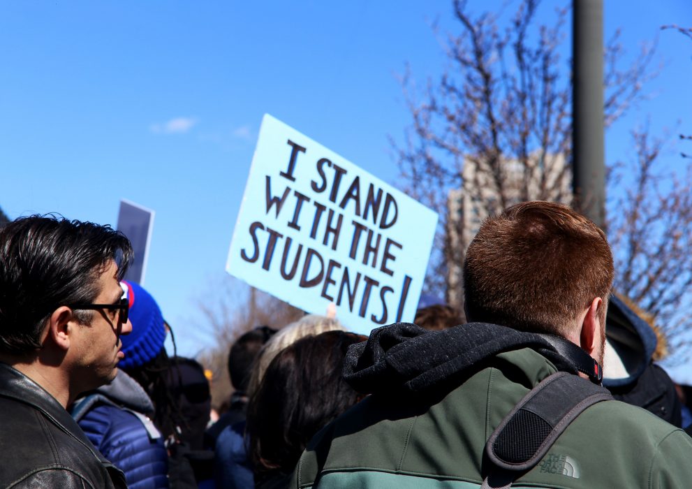 A participant holds a sign during the March for Our Lives Philadelphia on March 24.