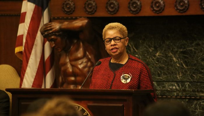 joyce wilkerson speaking at a podium