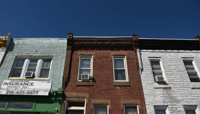 Three rowhouses in the Kensington neighborhood of Philadelphia