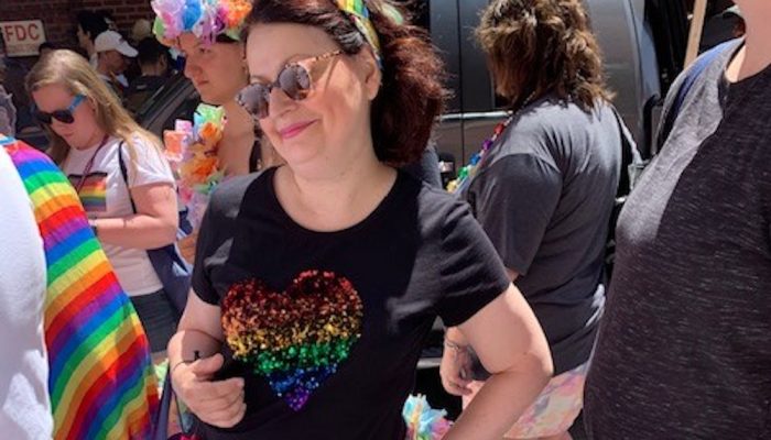 Shows Kathleen Brady, MD, smiling at a Philadelphia LGBTQ pride event in 2019.