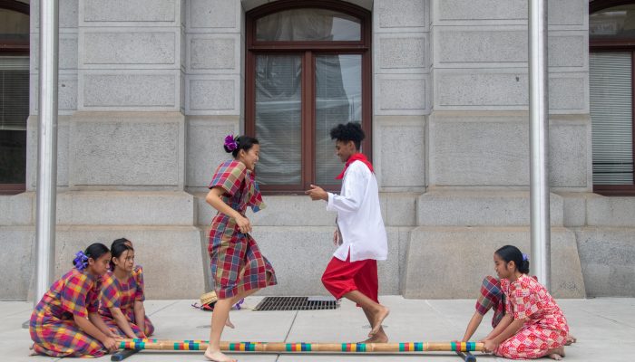 Young people performing a cultural dance at City Hall