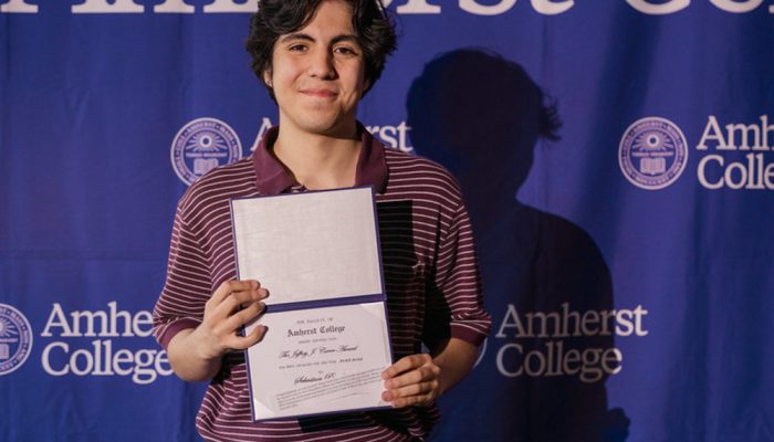 Office of Immigrant Affairs Summer Intern holding a certificate