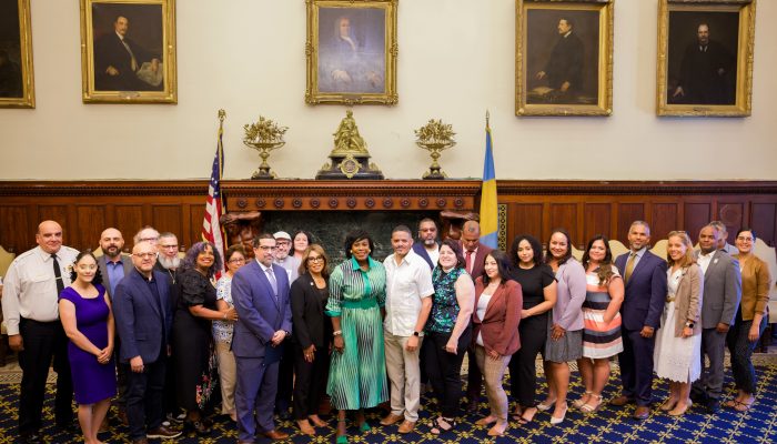 Mayor Parker and Director of Latino Engagement pose with community partners