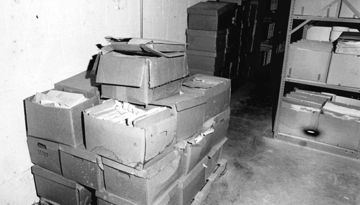 Black and white image of boxes stacked on top of each other