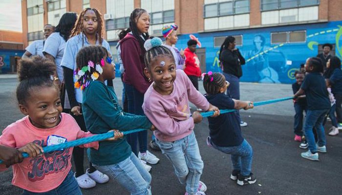 Children playing tug of war